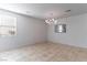 Spacious dining area with tile flooring and large windows at 9217 Quartz Hills Ave, Las Vegas, NV 89178