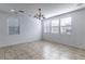 Bright dining room with tile floors and window blinds at 9217 Quartz Hills Ave, Las Vegas, NV 89178