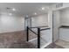 Upstairs hallway with access to laundry and bedrooms at 9217 Quartz Hills Ave, Las Vegas, NV 89178