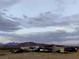 View of desert landscape with mountains in background at 936 Elon Ln, Indian Springs, NV 89018