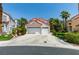 Two-story house with a three-car garage at 2604 Sun Reef Rd, Las Vegas, NV 89128