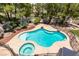 Inviting freeform pool and spa with safety fence at , Las Vegas, NV 89128