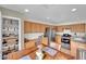 Well-lit kitchen featuring wooden cabinets, stainless steel appliances, and a cozy dining area at 10424 Wyatt Earp Ct, Las Vegas, NV 89129