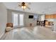 Living area with patio doors and hardwood floors at 10424 Wyatt Earp Ct, Las Vegas, NV 89129