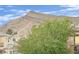 Scenic view of a majestic mountain range with blue sky, seen from the home at 10424 Wyatt Earp Ct, Las Vegas, NV 89129