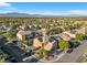 Aerial view of house, pool, and surrounding area at 10636 Amblewood Way, Las Vegas, NV 89144