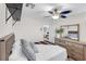 Cozy bedroom with ceiling fan and dresser at 10636 Amblewood Way, Las Vegas, NV 89144