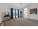 Bright bedroom with sliding doors to a patio at 10636 Amblewood Way, Las Vegas, NV 89144