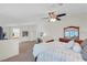 Bedroom with a ceiling fan and built-in desk at 10636 Amblewood Way, Las Vegas, NV 89144