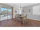 Dining room with hardwood floors, and access to the backyard at 10636 Amblewood Way, Las Vegas, NV 89144