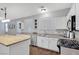 Modern kitchen with stainless steel appliances and an island at 10636 Amblewood Way, Las Vegas, NV 89144