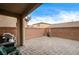 Spacious paved patio with built-in grill and room for outdoor furniture at 10636 Tulip Valley Rd, Las Vegas, NV 89179