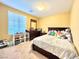 Cozy bedroom with a double bed and ample storage at 10636 Tulip Valley Rd, Las Vegas, NV 89179