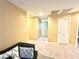 Upstairs hallway with carpeted flooring and access to bedrooms at 10636 Tulip Valley Rd, Las Vegas, NV 89179