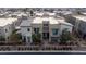 Aerial view of modern townhouses with landscaped yards at 11287 Idyllic Dr # 102, Las Vegas, NV 89135