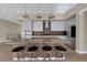 Modern kitchen with stainless steel appliances and breakfast bar at 11287 Idyllic Dr # 102, Las Vegas, NV 89135