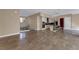 Open concept living and kitchen area with tile floors at 11287 Idyllic Dr # 102, Las Vegas, NV 89135