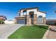 Beautiful two story house with desert landscaping and a concrete driveway at 1138 Gainesborough Ct, Henderson, NV 89015