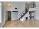 Foyer with hardwood floors, high ceilings, staircase and natural light at 1138 Gainesborough Ct, Henderson, NV 89015