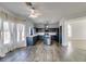 Modern kitchen with a center island, stainless steel appliances, and sleek backsplash at 1138 Gainesborough Ct, Henderson, NV 89015