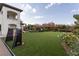 Landscaped backyard with artificial turf and soccer goal at 12 Bloomfield Hills Dr, Henderson, NV 89052