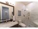 Modern bathroom with marble shower and vanity at 12 Bloomfield Hills Dr, Henderson, NV 89052