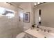 Clean bathroom with marble shower and vanity at 12 Bloomfield Hills Dr, Henderson, NV 89052