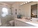 Elegant bathroom with marble shower and vanity at 12 Bloomfield Hills Dr, Henderson, NV 89052