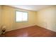 Bedroom with hardwood floors and natural light at 1701 E Katie Ave # 65, Las Vegas, NV 89119