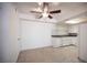Open eat-in kitchen featuring modern appliances, stylish countertop, and adjacent living area at 1701 E Katie Ave # 65, Las Vegas, NV 89119