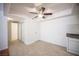 Bright kitchen with tile flooring, modern countertops, and easy access to the living area at 1701 E Katie Ave # 65, Las Vegas, NV 89119