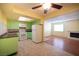 Bright kitchen with green cabinets and stainless steel appliances at 1701 E Katie Ave # 65, Las Vegas, NV 89119