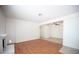 Bright living room with hardwood floors, fireplace, and seamless flow to the adjacent dining area at 1701 E Katie Ave # 65, Las Vegas, NV 89119