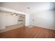 Spacious living room with tile and wood flooring, open to kitchen and ceiling fan at 1701 E Katie Ave # 65, Las Vegas, NV 89119