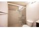 This renovated bathroom offers a tile surround and glass shower door at 1701 E Katie Ave # 65, Las Vegas, NV 89119