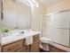 Bathroom with a shower/tub combo and wood-look floors at 1859 Cypress Greens Ave, Henderson, NV 89012