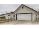 Attached garage with a new door and fresh coat of paint at 1947 Balboa Ave, Las Vegas, NV 89169