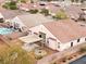 Aerial view of backyard with a pool, patio, pergola, and fire pit at 2026 Dakota Lodge Ave, Las Vegas, NV 89123