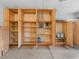 Garage storage with wood cabinets at 2026 Dakota Lodge Ave, Las Vegas, NV 89123