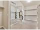 Large walk-in closet with carpet and built-in shelving at 2026 Dakota Lodge Ave, Las Vegas, NV 89123