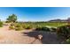 Backyard with golf course views, gravel, and desert landscaping at 2084 Tiger Links Dr, Henderson, NV 89012