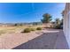 Spacious backyard with fire pit and golf course views at 2084 Tiger Links Dr, Henderson, NV 89012