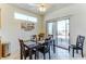 Dining area with sliding glass doors leading to backyard at 2084 Tiger Links Dr, Henderson, NV 89012