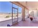 Enjoy the view from this screened porch, complete with ceiling fan at 2084 Tiger Links Dr, Henderson, NV 89012