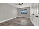 Bright bedroom with hardwood floors and large window at 209 N 21St St, Las Vegas, NV 89101