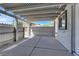 Covered patio with concrete flooring and gray wood-style pergola at 209 N 21St St, Las Vegas, NV 89101