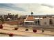 Upper-level exterior view of home with desert landscaping and tile roofing at 2119 Pebble Creek Ln, Laughlin, NV 89029