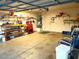 Spacious garage featuring built in shelving, work bench and ample storage space at 2119 Pebble Creek Ln, Laughlin, NV 89029