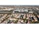 Wide aerial view of the community featuring mature trees and meticulously maintained landscaping at 251 S Green Valley Pkwy # 1212, Henderson, NV 89012