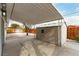 Backyard with covered patio, storage shed, and gravel at 257 Colleen Dr, Las Vegas, NV 89107